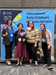 2025 institute co-chairs, Paula Grubbs and Chih-Ing Lim pose with presenters Megan Vinh and Ann Sam.